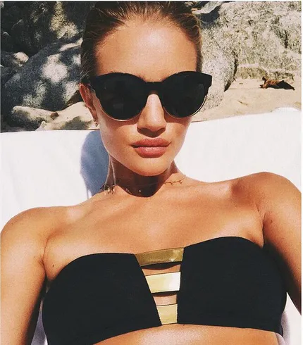 Rosie Huntington-Whiteley Soaked Up The Sun Revealed In A Black Bikini