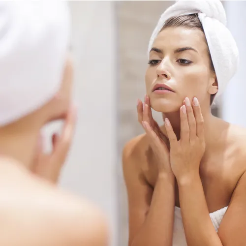 woman touching face