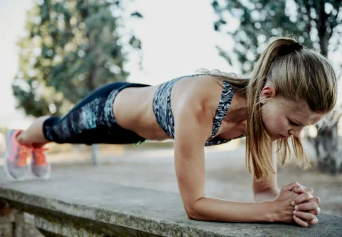 Woman planking.