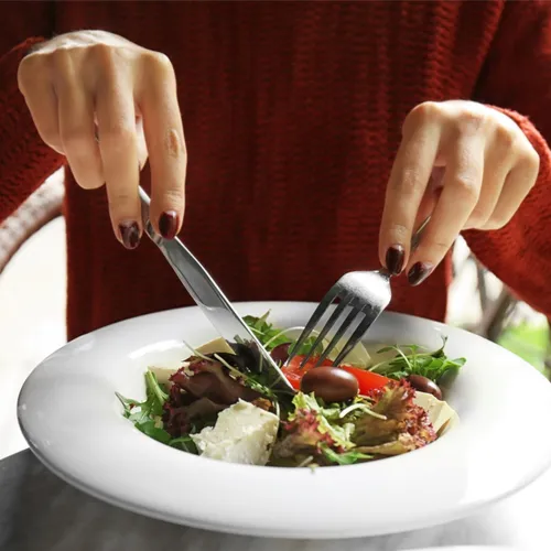woman having salad