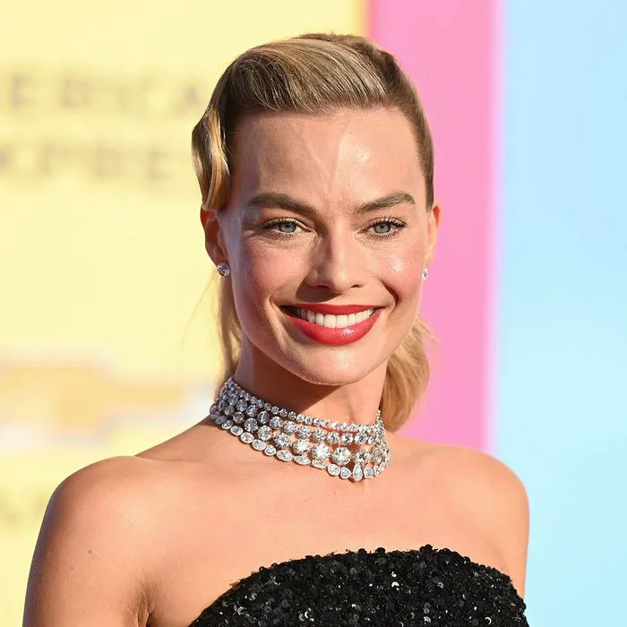 margot robbie headshot red carpet premiere barbie blonde hair