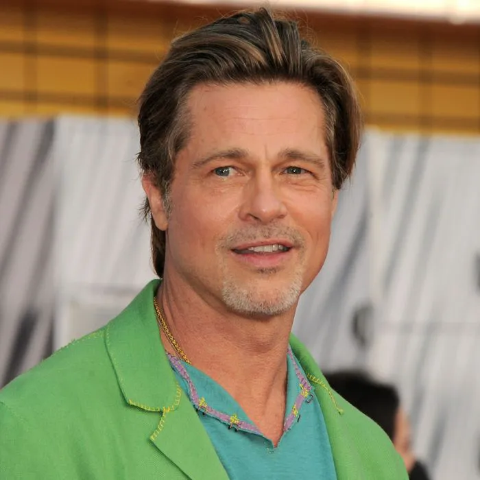 brad pitt bullet train premiere slicked-back hair green suit