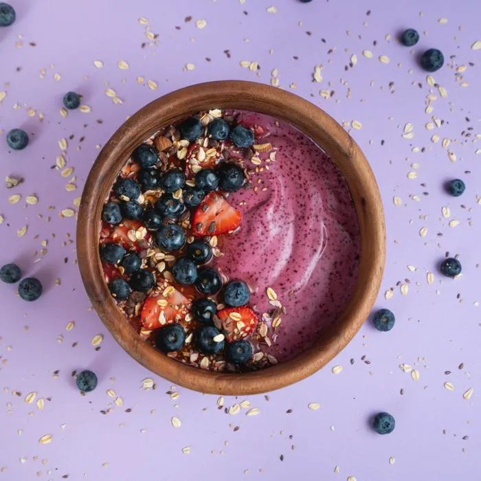 smoothie bowl with granola and berries