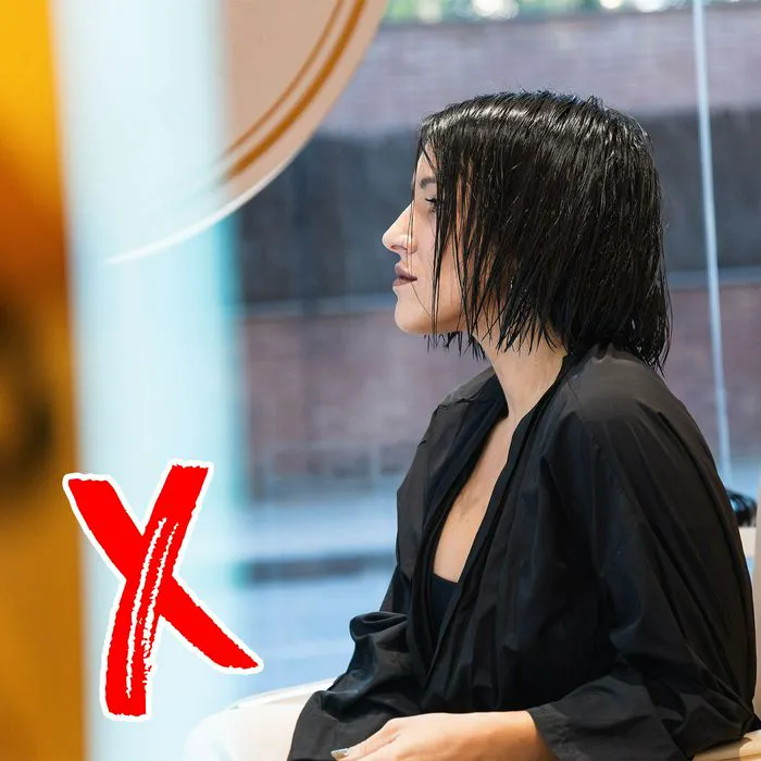 "Woman getting a bob haircut at the salon"