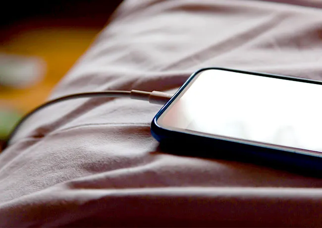 iphone-charging-bed