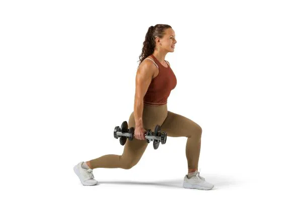 "Woman using BowFlex SelectTech Dumbbells"