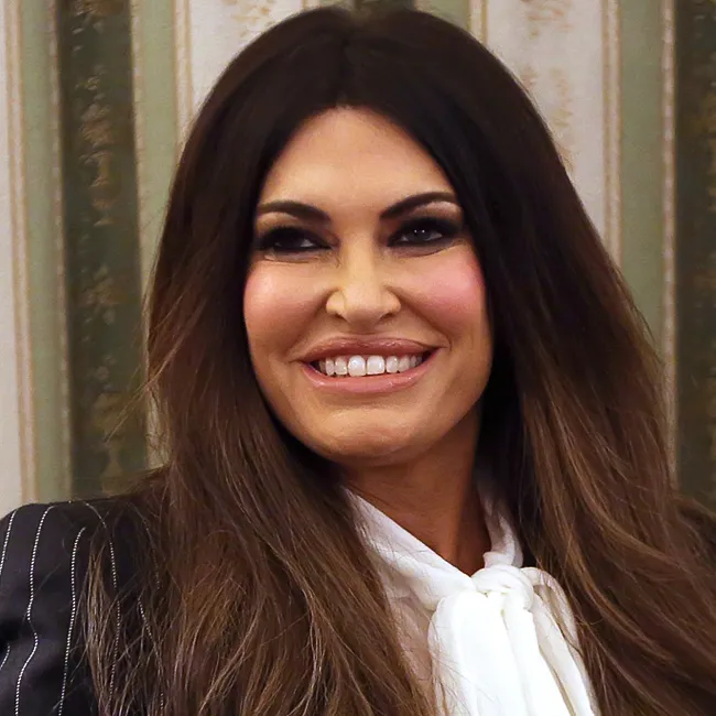"Bettina Anderson with Donald Trump Jr. and Kimberly Guilfoyle"