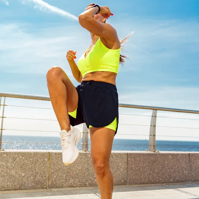 "Woman doing squats during workout session"