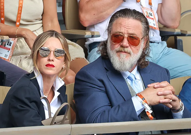 Russell Crowe and Britney Theriot attending the French Open.