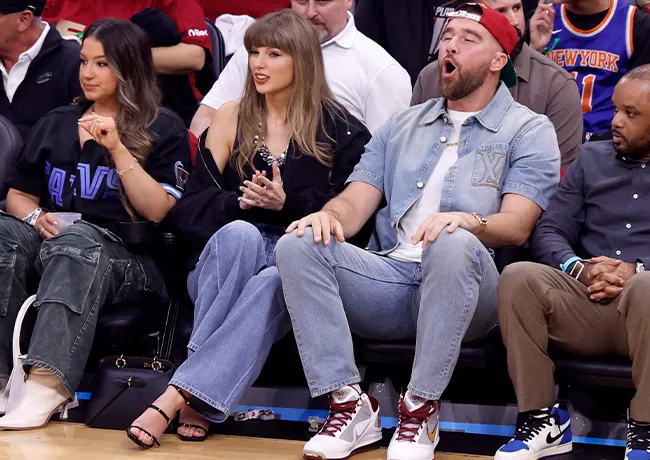 "Taylor Swift and Travis Kelce at the basketball game"
