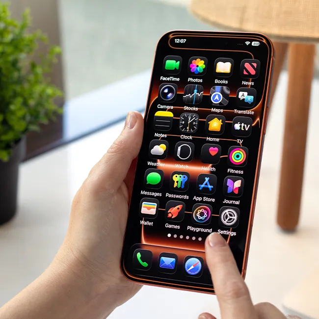 Woman holding an Apple iPhone 17 Pro in her hands.