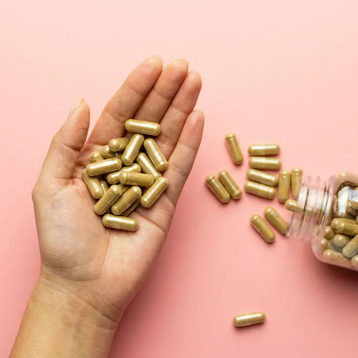 "Ashwagandha root and powder on a table"