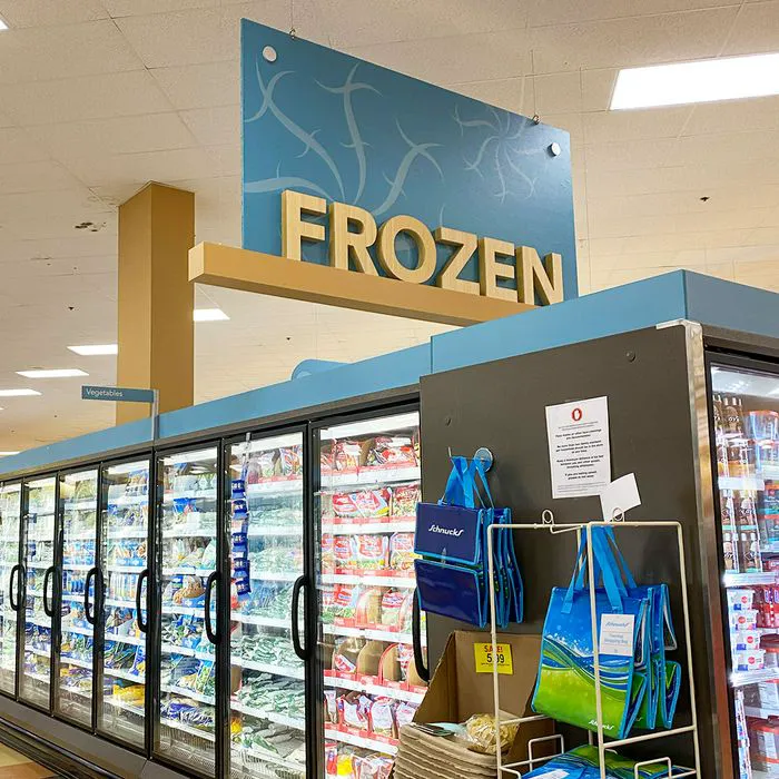 "Frozen food aisle in a grocery store"