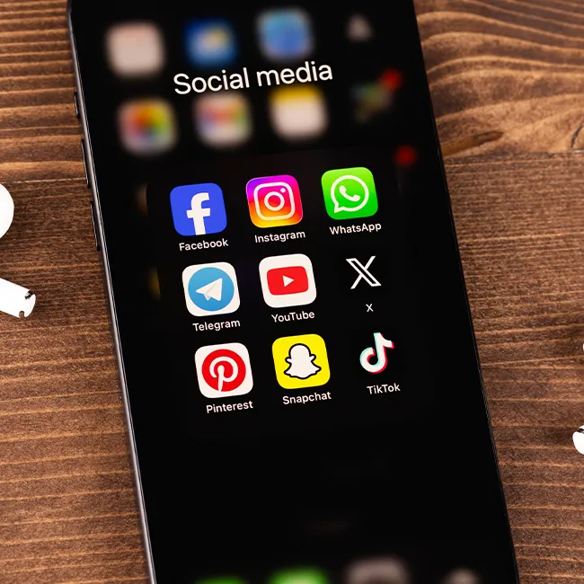 "Social media apps displayed on an iPhone"