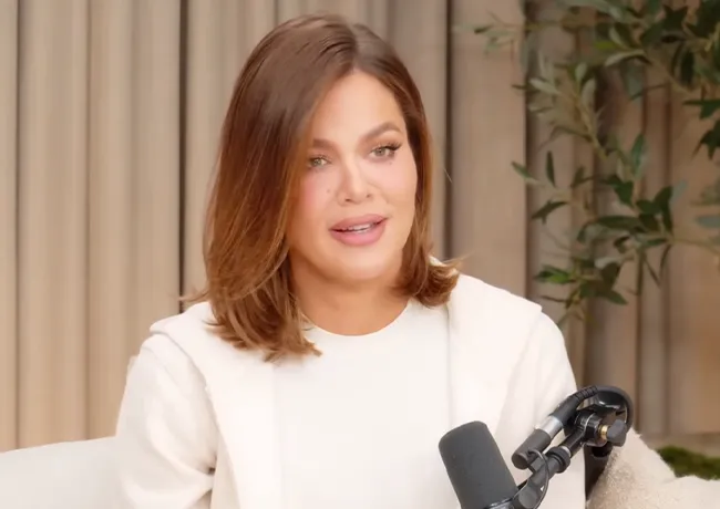 "Khloé Kardashian recording her podcast"