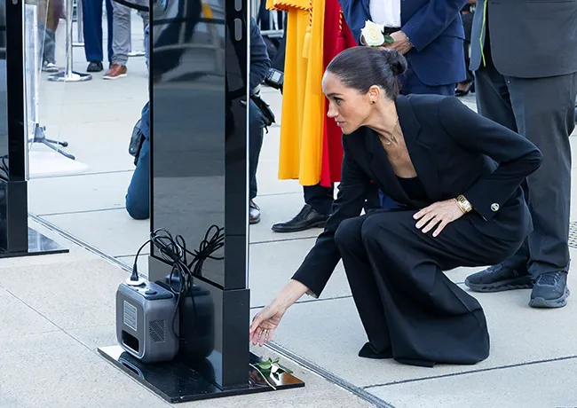 Meghan Markle Giorgio Armani suit Lost Screen Memorial art installation Geneva