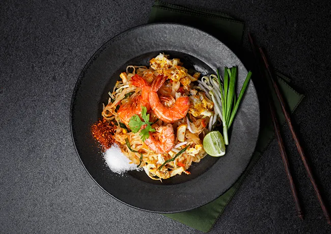 "A serving of Pad Thai, showcasing its ingredients"