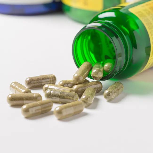 "Supplements spilling out onto table"
